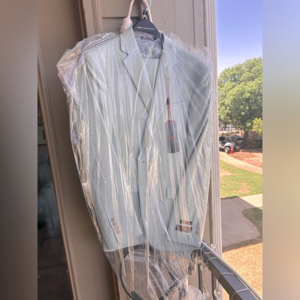 Egara Suit Set. Jacket, Pant and Belt included. Jacket 35 Short. Pants 34x30.